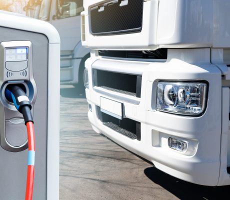 Electric,Vehicles,Charging,Station,On,A,Background,Of,A,Truck.